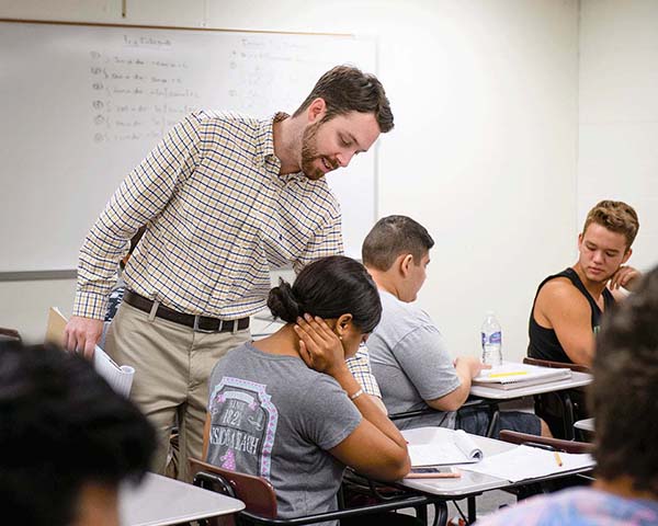 Instructor with students in a classroom