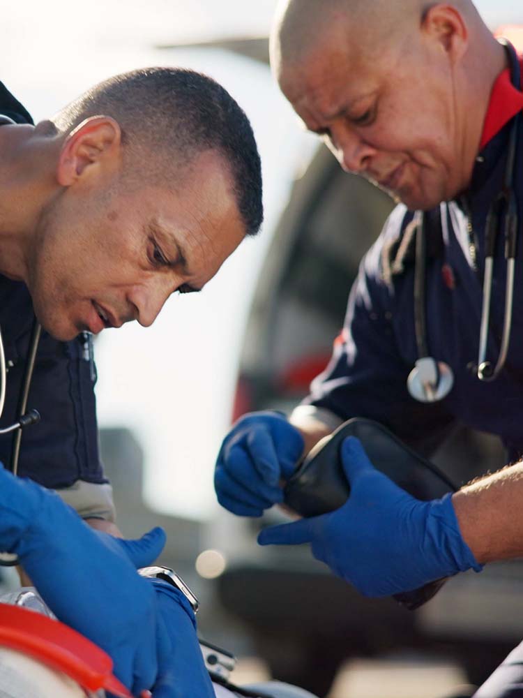 EMS applying emergency medical care